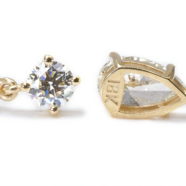 עגילי יהלום תלויים קראט וחצי כל אוזן