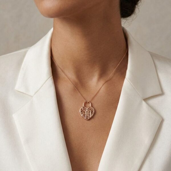 שרשרת תליון לב ומפתח פילגרין מעודנת מזהב צהוב 18K של Tiffany & Co.